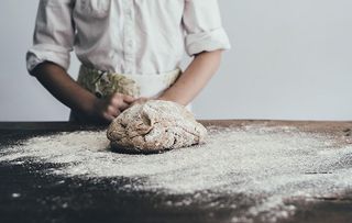 Baker baking bread.