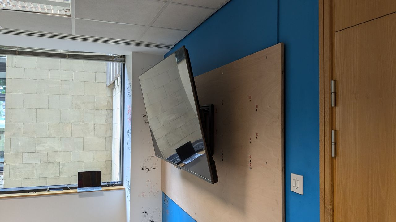 Sanus OLT7 with Amazon Omni QLED attached and tilting