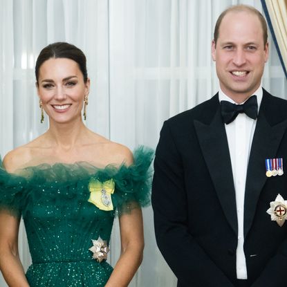 Kate Middleton wears a green ball gown to attend a dinner hosted by the Governor General of Jamaica at King's House on March 23, 2022