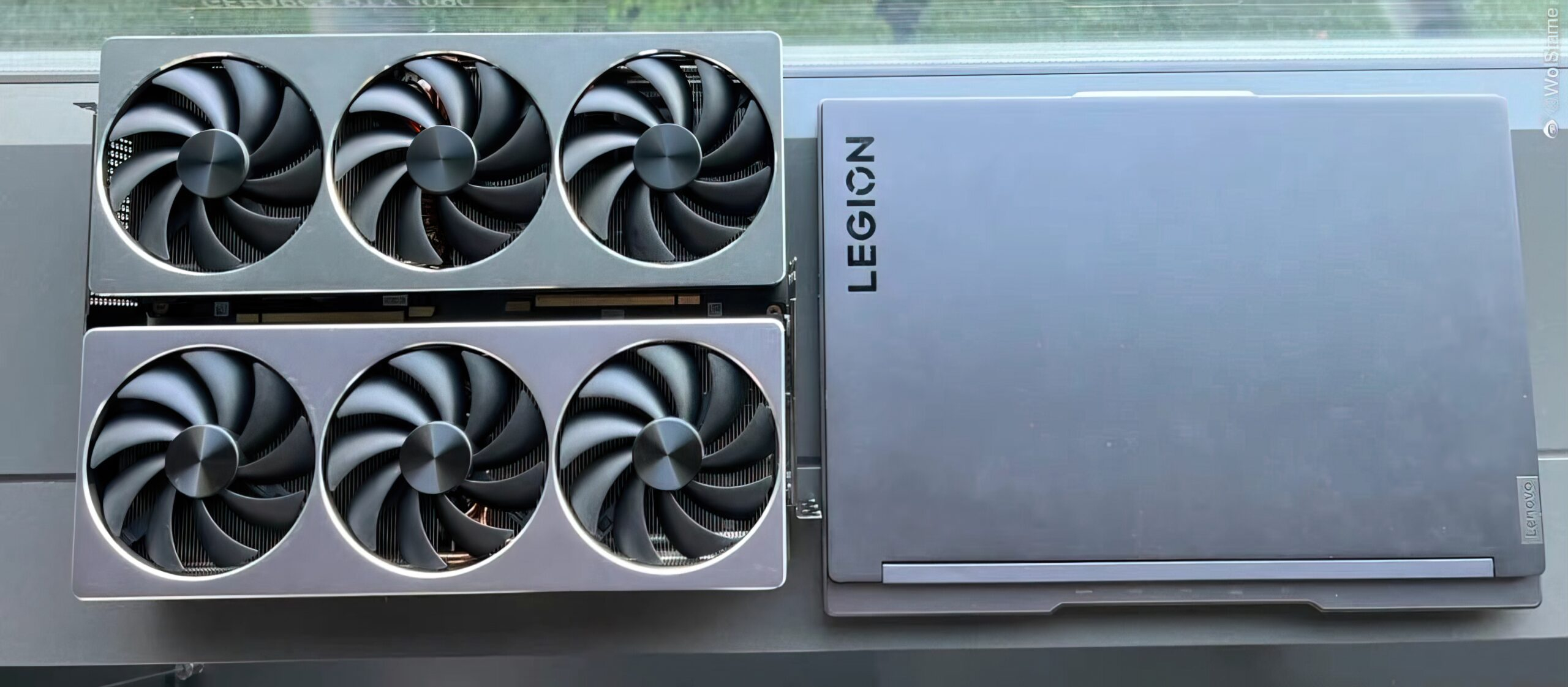 The left image is two graphic cards, and on the right is a corps laptop
