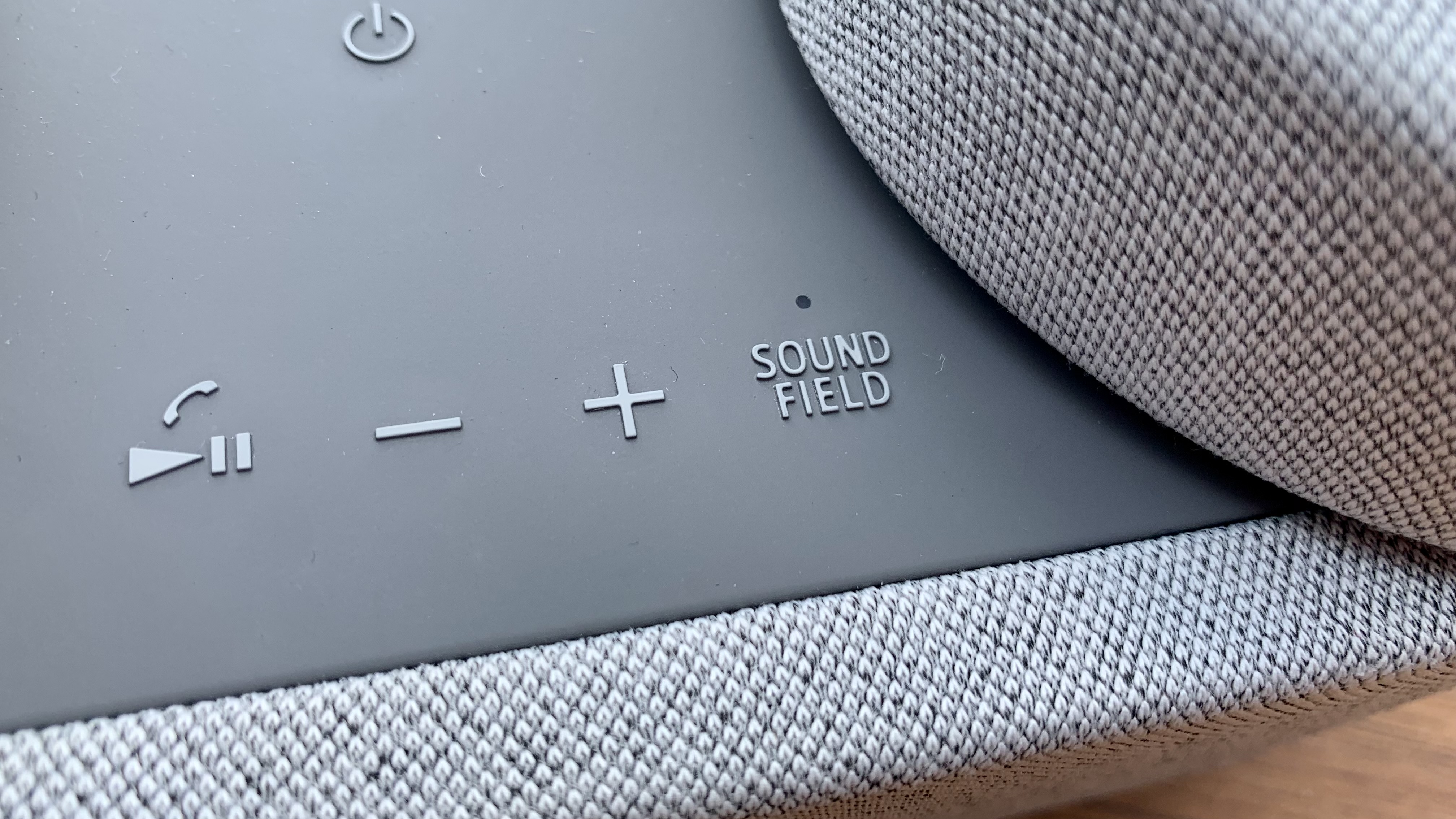 Sony HT-AX7 close up of the Sound Field button