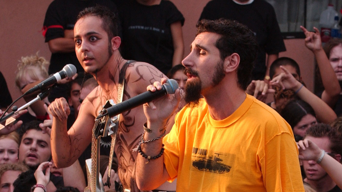 Serj Tankian and Daron Malakian of System Of A Down onstage during the filming of Chop Suey in 2001