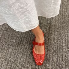 Woman in red jelly shoes