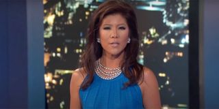 Julie Chen in a blue dress on the Big Brother stage.