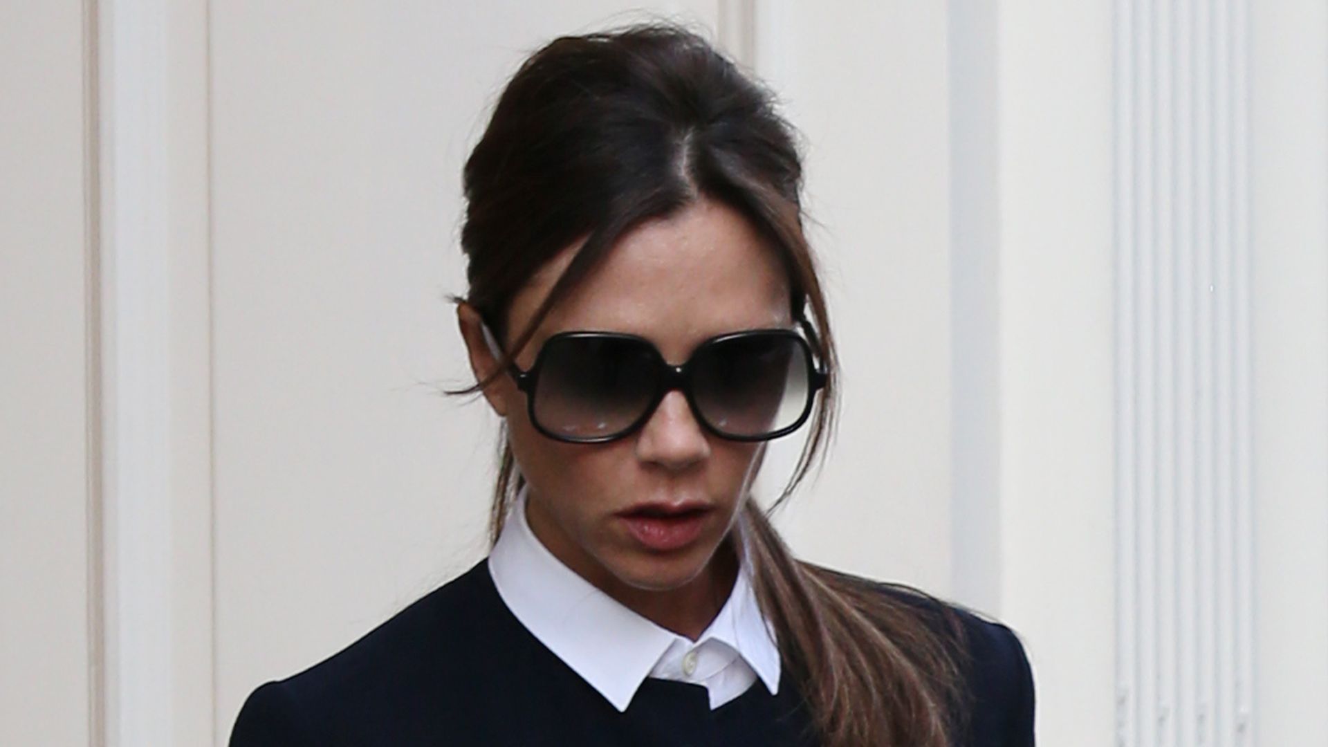 You rarely see Victoria Beckham wearing flats, but she made an exception for these chic white loafers