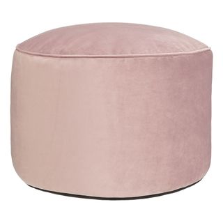 pink velvet pouffe with white background