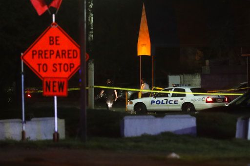 Police operate at a crime scene outside the Cameo Nightclub after a reported fatal shooting, Sunday, March 26, 2017, in Cincinnati