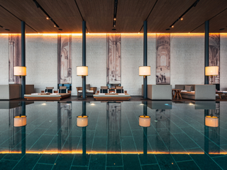 An Oriental-Alpine-style spa features glamorous decor and water reflections.