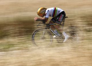 Soudal Quick-Step's Belgian rider Remco Evenepoel cycles during the 4th stage of the 77th edition of the Criterium du Dauphine cycling race, a 17,4 km individual time trial between Charmes-sur-Rhône and Saint-Péray, on June 11, 2025. (Photo by Anne-Christine POUJOULAT / AFP) (Photo by ANNE-CHRISTINE POUJOULAT/AFP via Getty Images)
