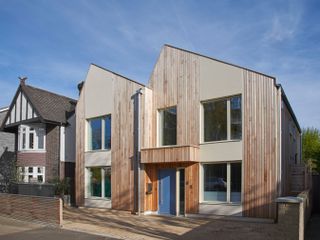 suburban timber framer house with timber cladding