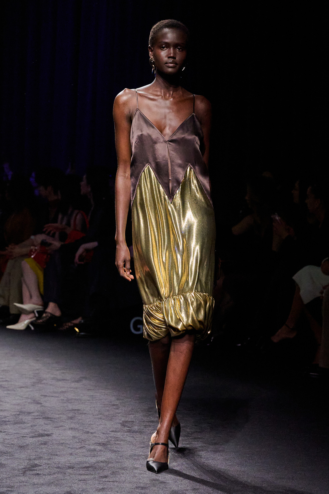 a model walks the ferragamo fall/winter 2026 runway