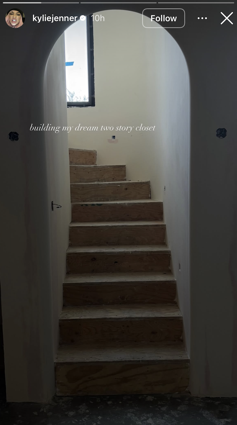 screenshot of kylie jenner's instagram story picture of staircase in arch doorway with caption "building my dream two story closet"