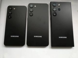 Three smartphone dummies believed to represent the Samsung Galaxy S23 (L), Galaxy S23 Plus and Galaxy S23 Ultra
