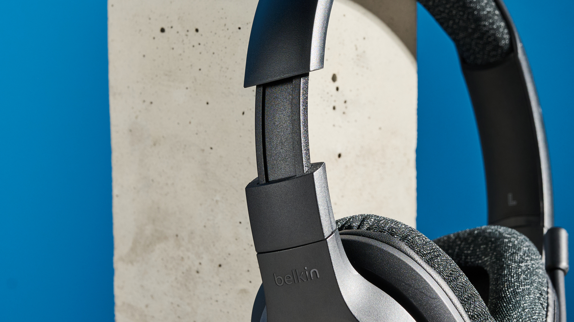 A black Belkin SoundForm Adapt wireless headset