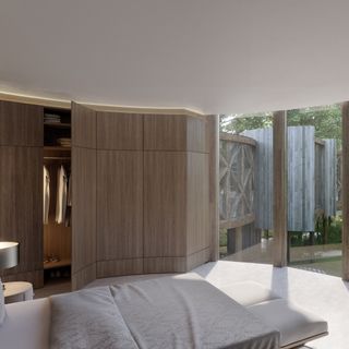 tree house bedroom with white bed and wooden storage unit