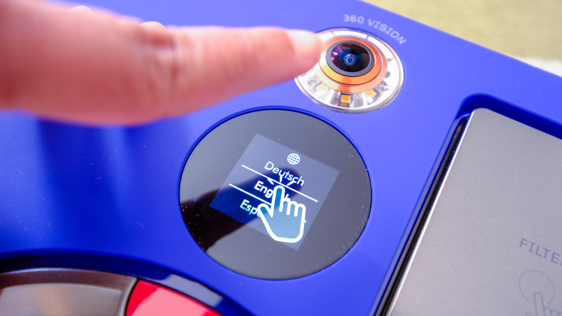 The touchscreen is basically a button you can press on the Dyson 360 Vis Nav