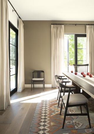 a modern and minimal Beige dining room, with gray tones