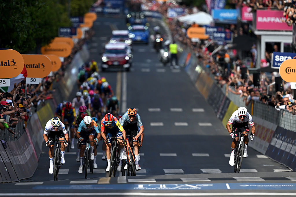 COSENZA, ITALY - MAY 12: (L-R) Orluis Aular of Venezuela and Team Movistar, Giulio Ciccone of Italy and Team Lidl - Trek, Ben Turner of Great Britain and Netcompany INEOS Cycling Team and stage winner Jhonatan Narvaez of Ecuador and UAE Team Emirates - XRG sprint at finish line during the 109th Giro d&amp;amp;apos;Italia 2026, Stage 4 a 138km stage from Catanzaro to Cosenza / #UCIWT / on May 12, 2026 in Cosenza, Italy. (Photo by Dario Belingheri/Getty Images)