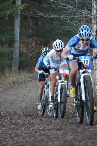 Alison Dunlap leads Kelli Emmett and Heather Irminger