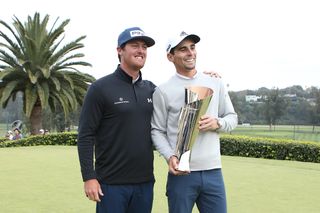 Joaquín Niemann (right) celebrates with the Genesis Invitational trophy alongside friend and competitor Mito Pereira