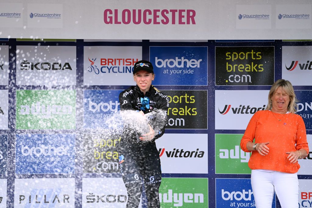 GLOUCESTER ENGLAND JUNE 08 Lorena Wiebes of Netherlands and Team DSM celebrates winning the stage on the podium ceremony after the 8th The Womens Tour 2022 Stage 3 a 1079km stage from Tewkesbury to Gloucester WomensTour UCIWWT on June 08 2022 in Gloucester England Photo by Justin SetterfieldGetty Images