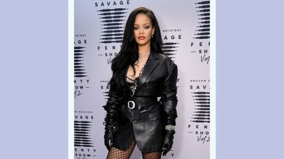 rihanna on the red carpet for a savage x fenty show wearing black leather