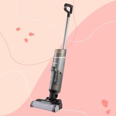 Shark HydroVac Cordless Hard Floor Cleaner on a pink background