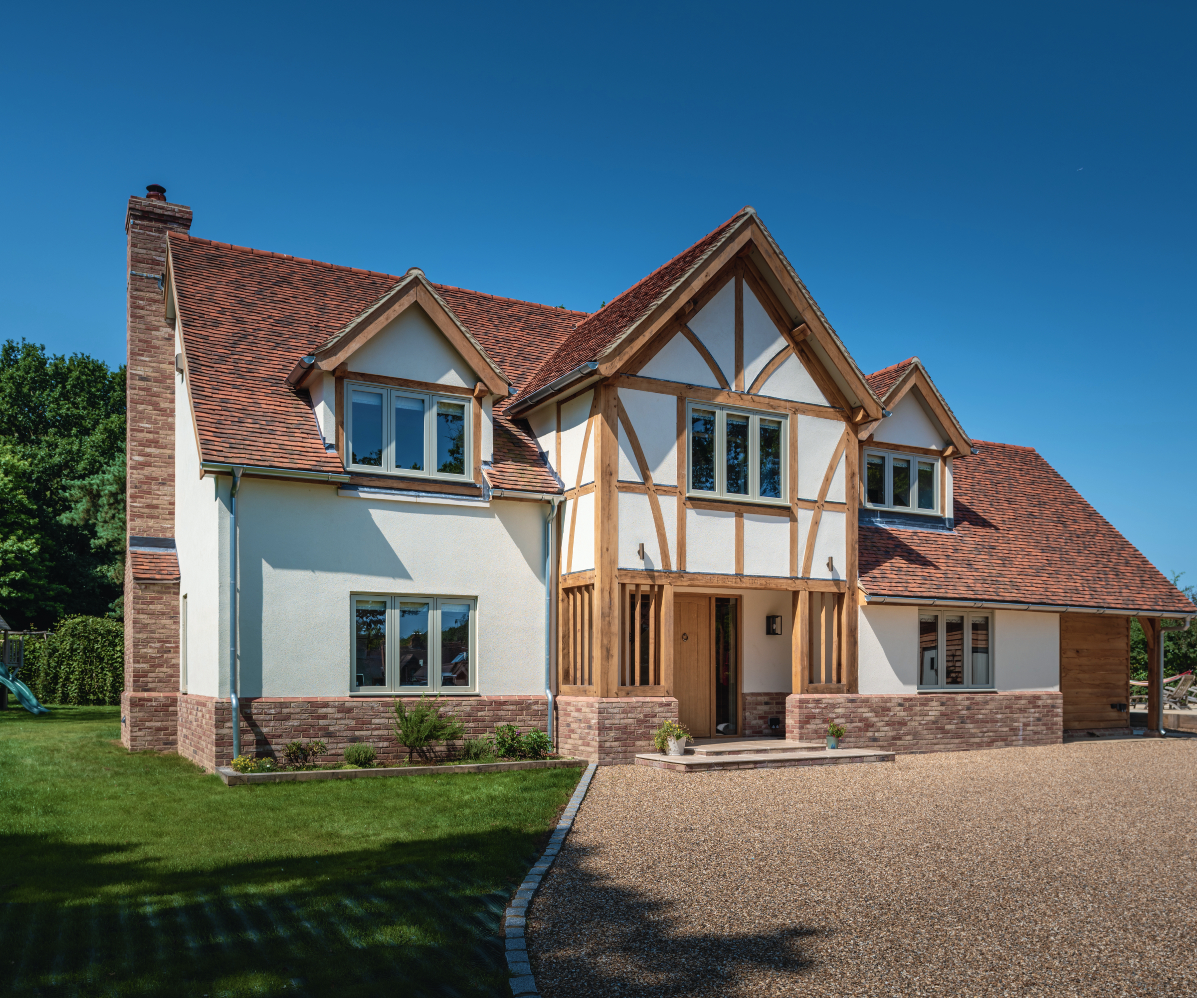 traditional style oak frame home with tiled roof