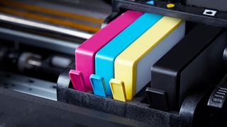 A close up image of cartridges in a printer