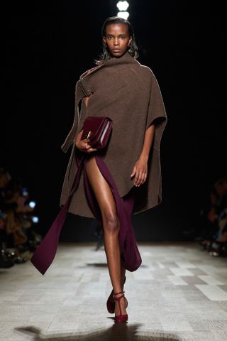 a model walks the Ferragamo fall/winter 2024 runway wearing T-bar pumps