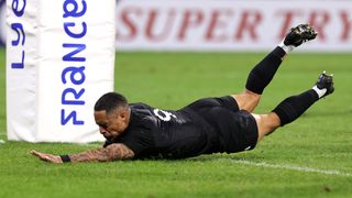 Aaron Smith of New Zealand scores his team's sixth try during the Rugby World Cup France 2023 ahead of