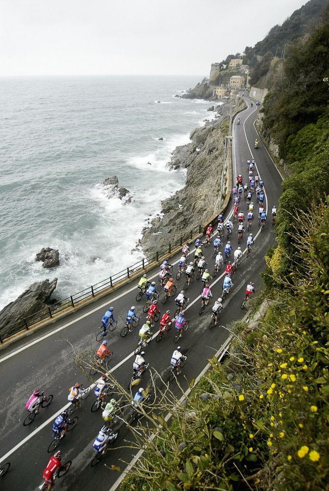 The peloton rides next to the sea in Varazze during the 95th edition of Milan-San Remo