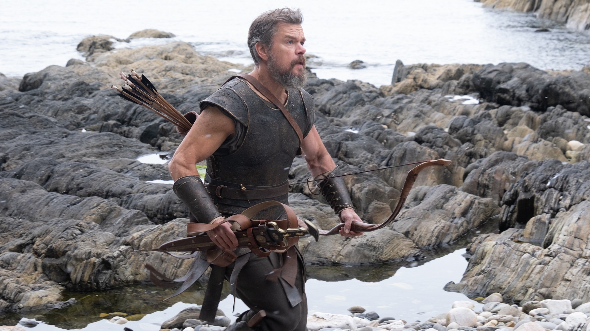 Matt Damon is Odysseus running on a beach in THE ODYSSEY, written, produced, and directed by Christopher Nolan.