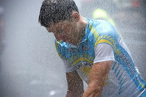A rider from the Kazakhstan National Team cools down after another hot day on the roads of Malaysia.