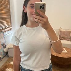 An image of Who What Wear fashion writer @avahgilchrist wearing one of the best denim shorts for women in 2026.
