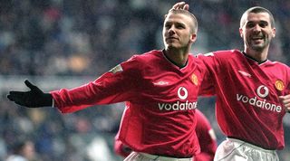 David Beckham and Roy Keane celebrate a Manchester United goal scored by the England midfielder in 2000.