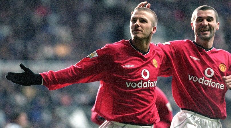 David Beckham and Roy Keane celebrate a Manchester United goal scored by the England midfielder in 2000.