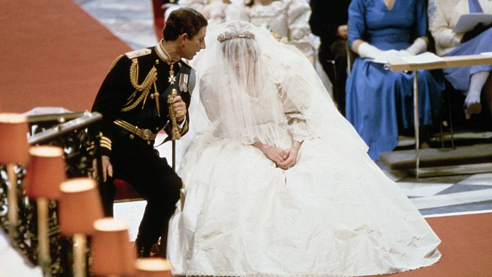 Prince Charles and Lady Diana Spencer, sitting and whispering to each other during their wedding ceremony at at St Paul&#039;s Cathedral, London, 27th July 1981.