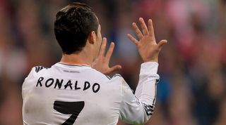 Cristiano Ronaldo celebrates after scoring for Real Madrid against Bayern Munich and registering a new Champions League goals mark for a season in April 2014.