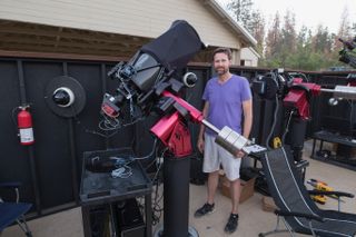 Kevin Morefield learned how to photograph astronomical objects in his spare time, through lots of trial and error. Morefield pictures here with an automated telescope, which he can operate with his phone or PC, that he uses to capture night-sky images