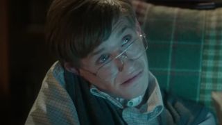 Eddie Redmayne in a darkened room as Stephen Hawking in The Theory of Everything