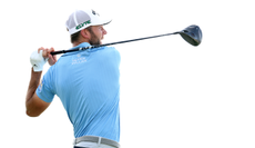 Sam Burns hits a driver off the tee