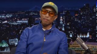 Pharrell Williams looking into the camera while on The Tonight Show.