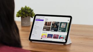 iPad on a table being controlled by a woman via Eye Tracking