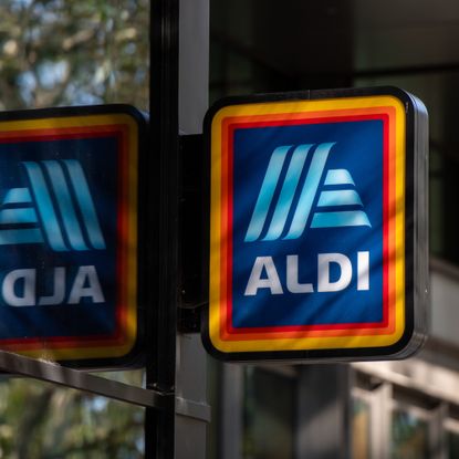 A sign outside an Aldi Local convenience store