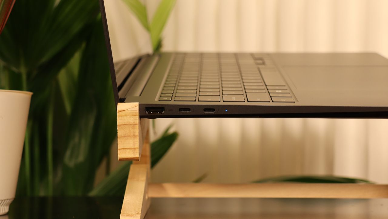 Samsung Galaxy Book3 on a wooden stand