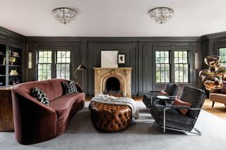 A dark grey walled sitting room