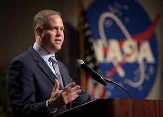 NASA Administrator Jim Bridenstine delivers remarks at the Johnson Space Center in Houston on Aug. 2, 2018. 