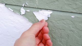 Peeling paint on wall