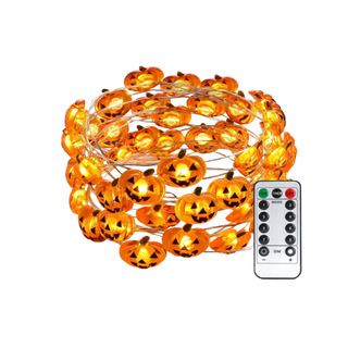 A cluster of pumpkin string lights